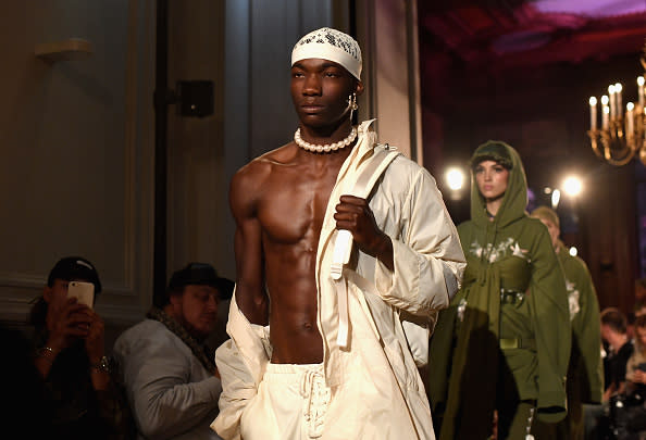 PARIS, FRANCE - SEPTEMBER 28: A model walks the runway during FENTY x PUMA by Rihanna at Hotel Salomon de Rothschild on September 28, 2016 in Paris, France. (Photo by Jacopo Raule/Getty Images for Fenty x Puma)