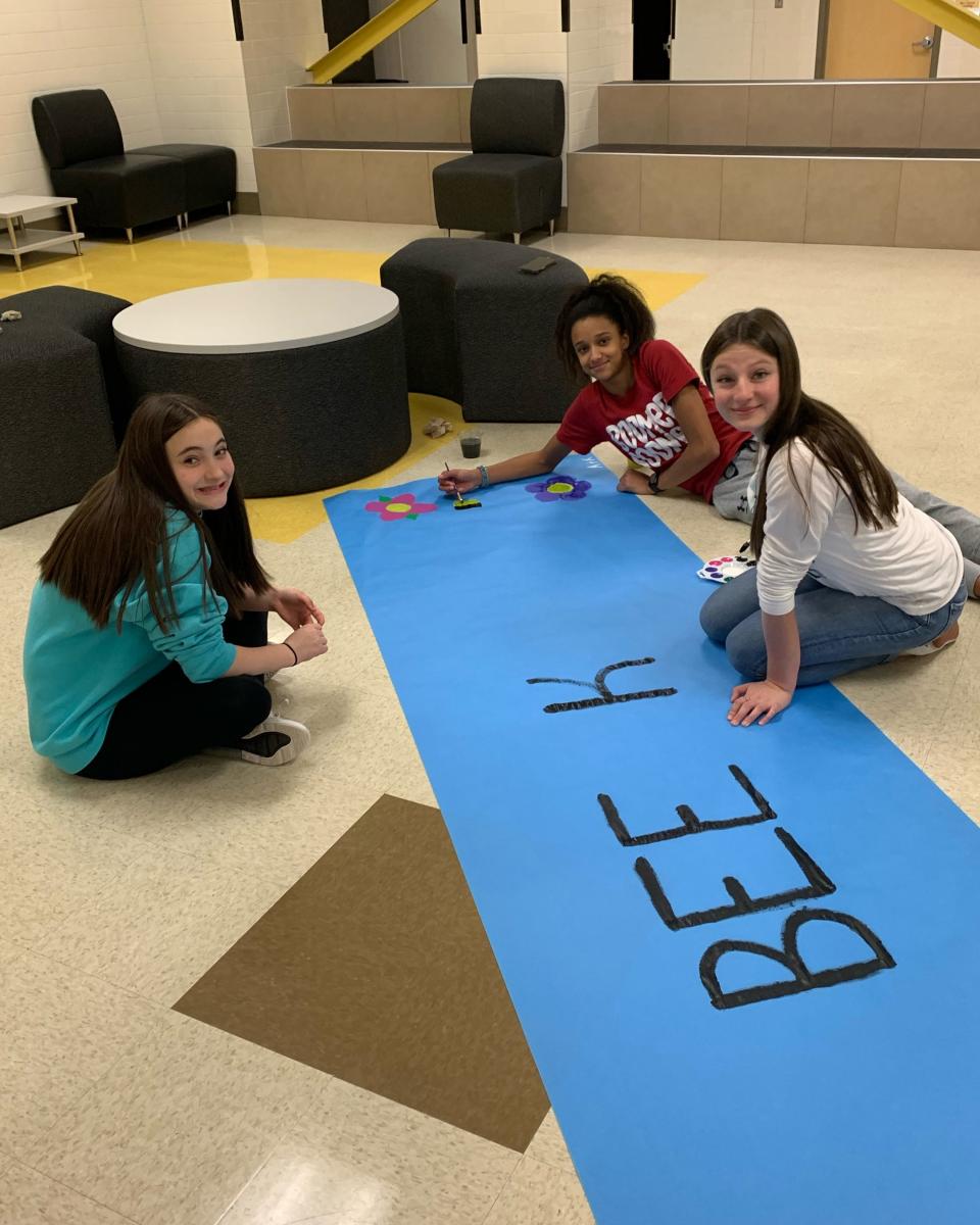KINDNESS CHALLENGE POSTER: Students took time after school to create posters and banners to hang throughout the Scott Middle School campus with slogans and saying that reflect an attitude of treating others kindly.