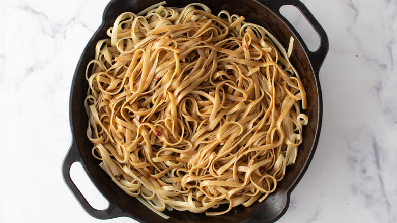 noodles in black pan