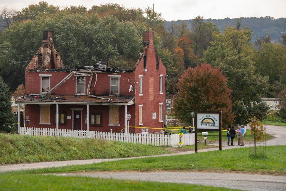 The fire-damaged Horn farmhouse, which served as the center’s headquarters, is seen soon after the late October fire. Part of the wood to rebuild the farmhouse will come from oaks lumbered as part of the York Water Co.’s Lake Williams dam replacement project.