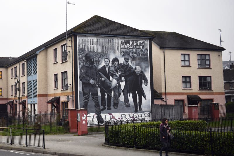 A mural depicts depicts the massacre known as Bloody Sunday in Derry, Northern Ireland, on January 30, 1972. File Photo by Neil Hall/EPA-EFE