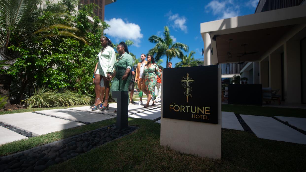  Contestants walking through The Fortune Hotel resort from the series' opener. 