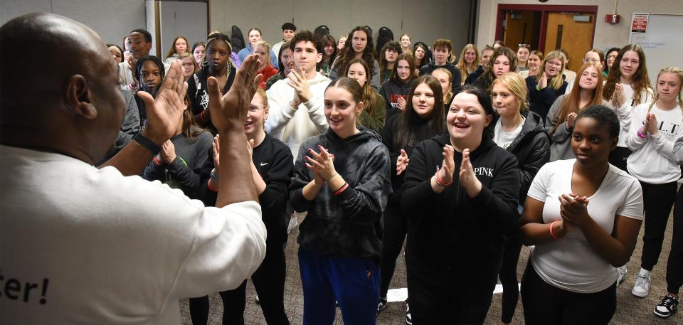 Carl Graves of the Monroe County Intermediate School District leads a clapping game as an ice breaker with the high school students before breaking them out into squad games and lessons at the #iMatter Youth Summit.