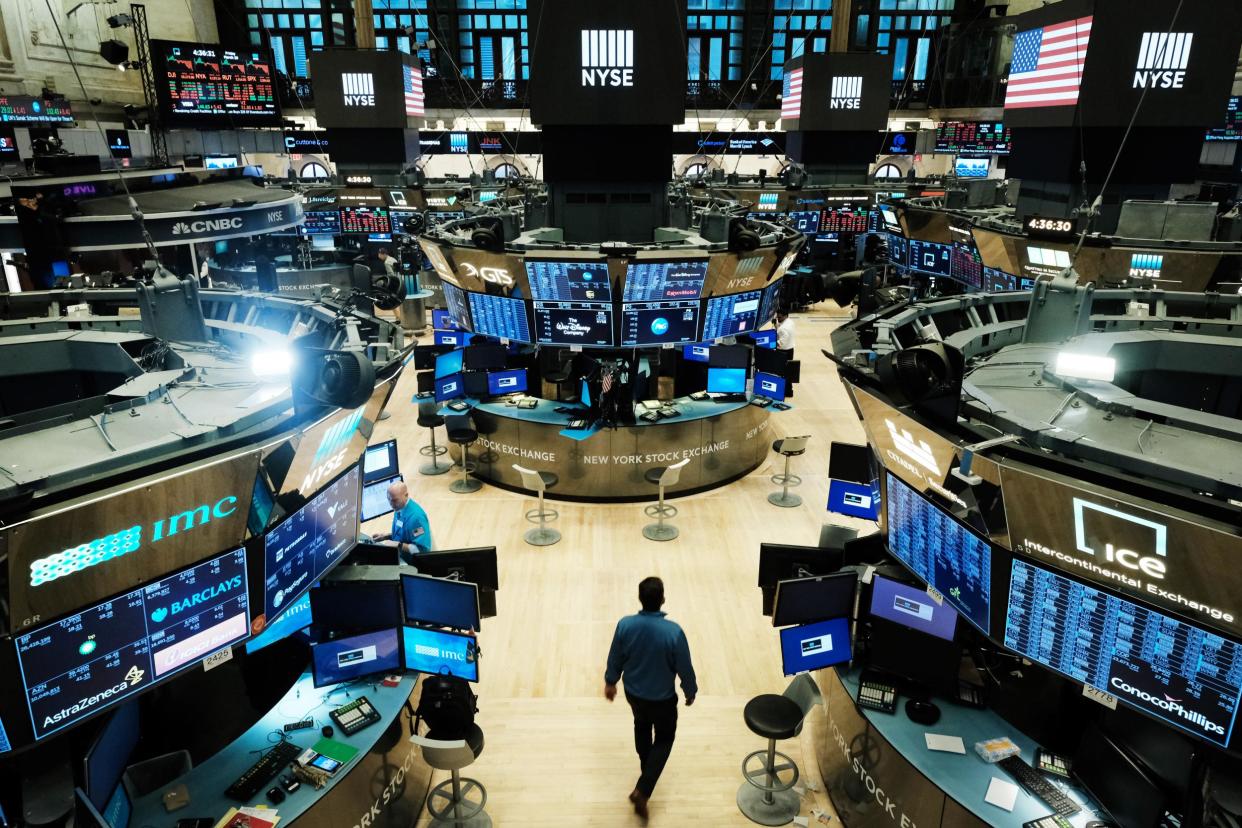 Trading on the floor of the New York Stock Exchange is now fully electronic to protect employees from spreading the coronavirus. The market had its worst first quarter since the 2008 global financial crisis: Photo by Spencer Platt/Getty Images