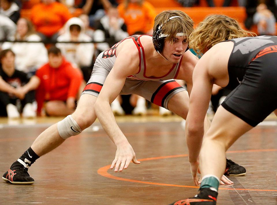 Crestview's Hayden Kuhn wrestles Marion Pleasant's Daxten Chase during their 144lb match at the JC Gorman Wrestling Tournament Saturday, Jan. 7, 2023. TOM E. PUSKAR/ASHLAND TIMES-GAZETTE