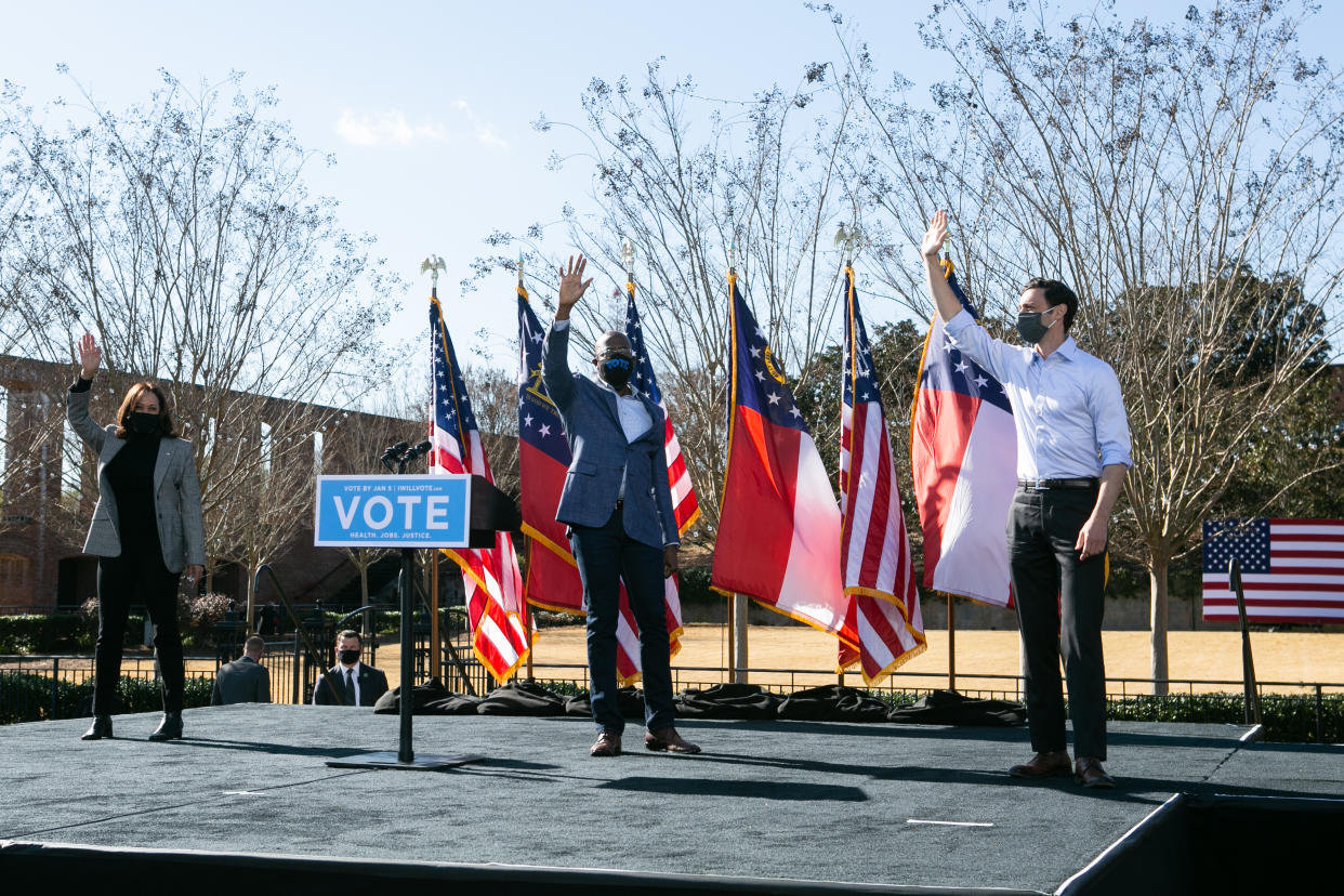 Vice President-elect Kamala Harris with Georgia Democratic Senate candidates Rev. Raphael Warnock and Jon Ossoff in Columbus, Georgia. (Photo by Jessica McGowan/Getty Images)