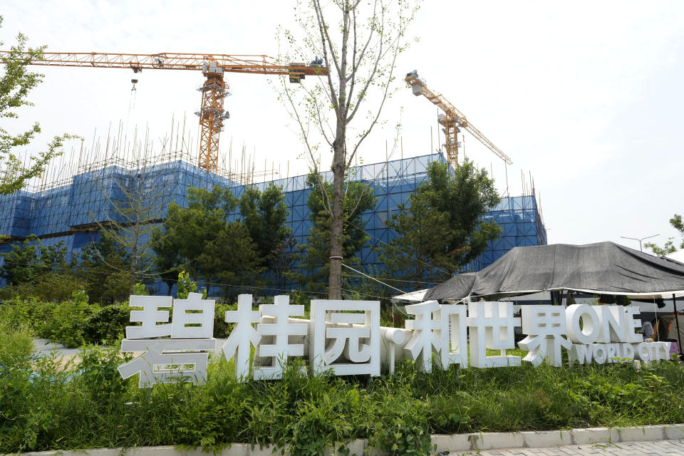 The Country Garden One World City project under construction is seen on the outskirts of Beijing, Thursday, Aug. 17, 2023. China's government is trying to reassure jittery homebuyers after the major real estate developer missed a payment on its multibillion-dollar debt, reviving fears about the industry's shaky finances and their impact on the struggling Chinese economy. (AP Photo/Ng Han Guan)