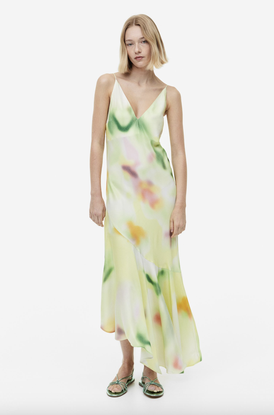 blonde model wearing green tie-dye Asymmetric-hem Slip Dress (photo via H&M)