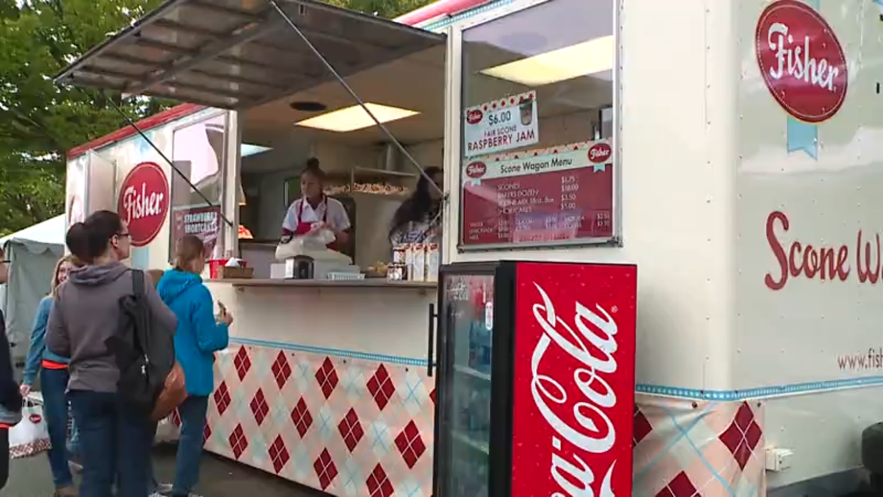 <div>Fairgoers line up for hot Fisher Scones at the Washington State Fair in Puyallup, Wash.</div>