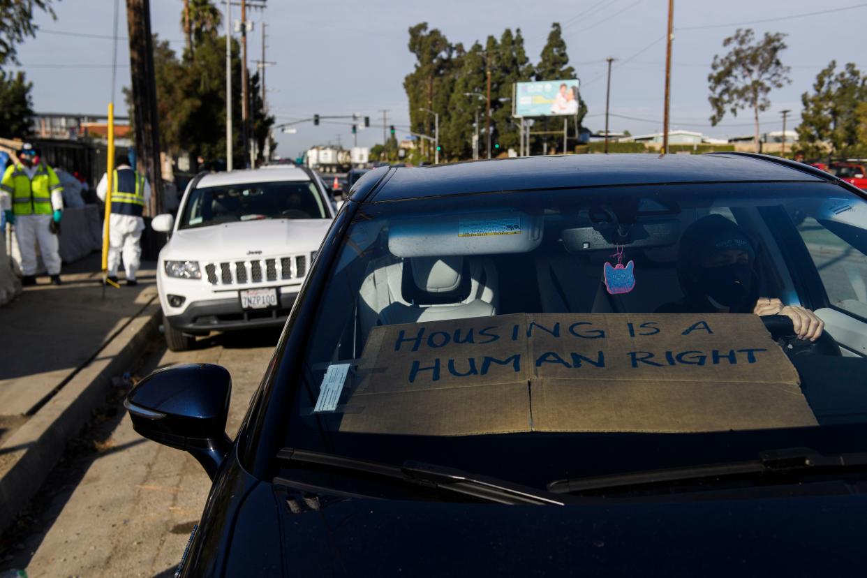  Protest sign outside Los Angeles encampment . 