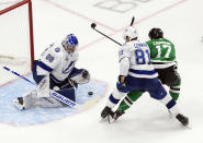 Tampa Bay Lightning goalie Andrei Vasilevskiy (88) makes a save against Dallas Stars' Nick Caamano (17) as Lightning's Erik Cernak (81) defends during second-period NHL Stanley Cup finals hockey game action in Edmonton, Alberta, Monday, Sept. 28, 2020. (Jason Franson/The Canadian Press via AP)