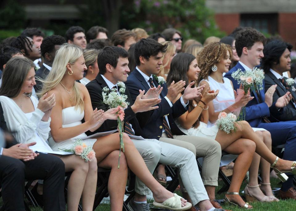 Graduates applaud during the Thayer Academy commencement in Braintree on Saturday, June 10, 2023.