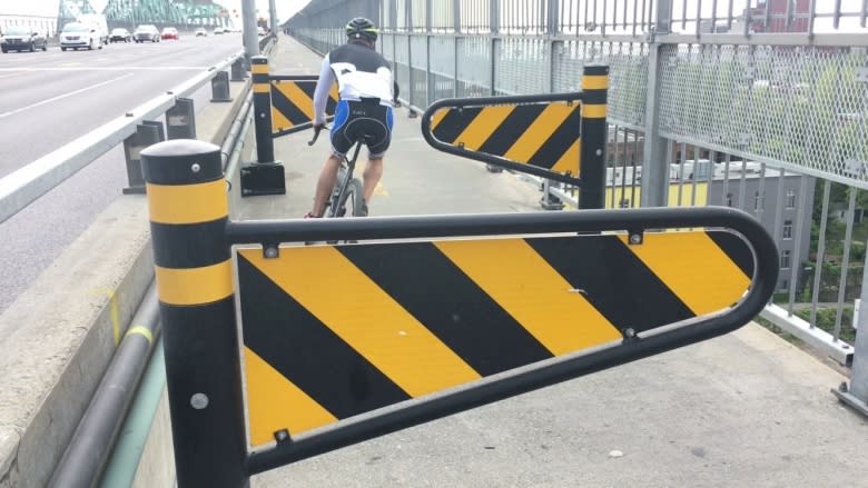 Bike gates on Jacques Cartier Bridge path modified after cyclists point out dangers