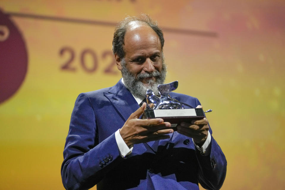 Luca Guadagnino holds the Silver Lion award for best director for the film 'Bones and All' at the closing ceremony of the 79th edition of the Venice Film Festival in Venice, Italy, Saturday, Sept. 10, 2022. (AP Photo/Domenico Stinellis)