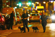 <p>Police officers attend to the scene after a vehicle collided with pedestrians near a mosque in the Finsbury Park neighborhood of North London, Britain June 19, 2017. (Neil Hall/Reuters) </p>