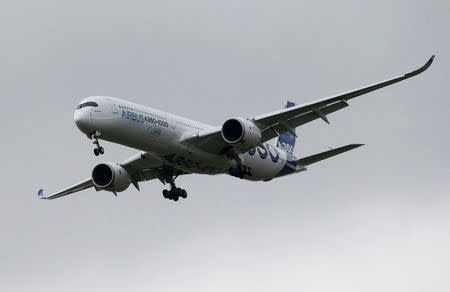 An Airbus A350-1000 lands during its maiden flight event in Colomiers near Toulouse, Southwestern France, November 24, 2016. REUTERS/Regis Duvignau