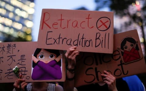 A rally in Hong Kong against the proposed extradition bill with China  - Credit: Reuters