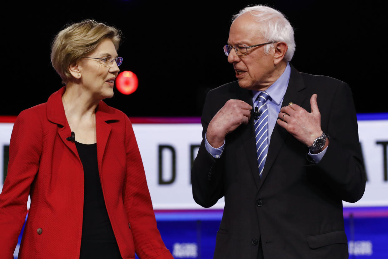 Sen. Elizabeth Warren, D-Mass., and Sen. Bernie Sanders, I-Vt., former Vice President Joe Biden, participate in a Democratic presidential primary debate on Feb. 25, 2020, in Charleston, S.C. (Matt Rourke/AP)