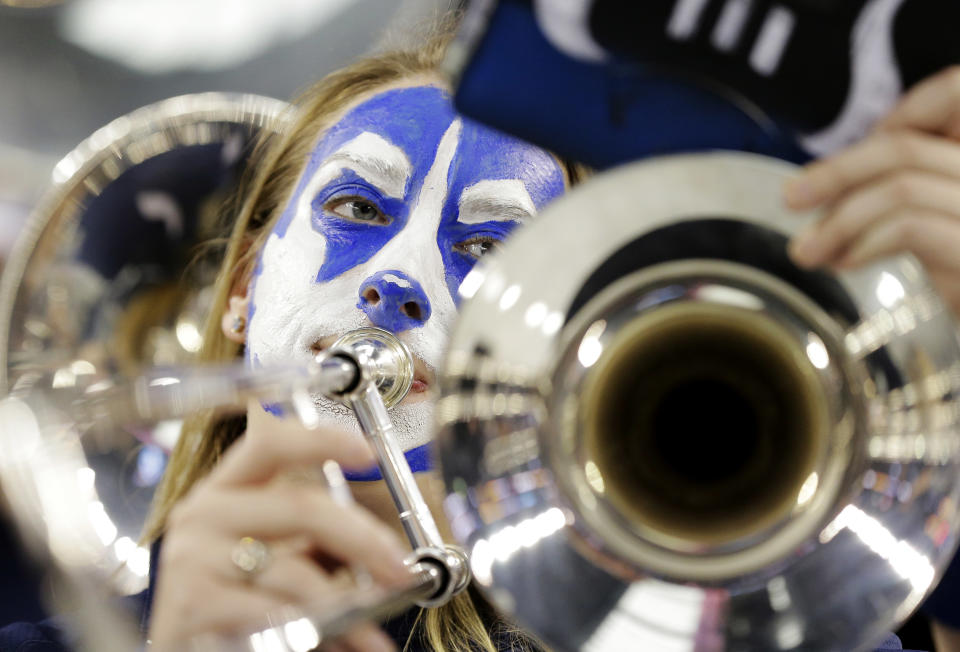 The Connecticut band plays before their NCAA Final Four tournament college basketball semifinal game against Florida Saturday, April 5, 2014, in Dallas. (AP Photo/Eric Gay)