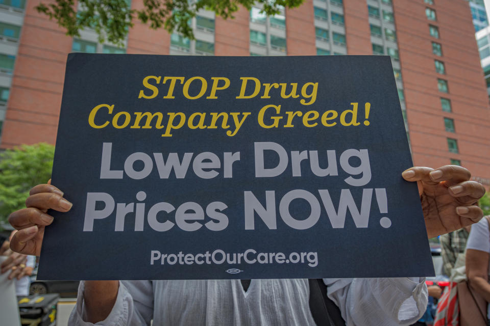 MANHATTAN, NEW YORK, UNITED STATES - 2023/08/16: Participant seen holding a sign at the protest. NYC Health Advocates organized a rally outside Jones Day offices in Manhattan, the law firm currently representing drug corporations suing to stop medicare negotiations for lower drug prices. The action was held in solidarity with protests around the country to hold drug corporations accountable for trying to roll back the new law in the courts as part of Countdown to Lower Drug Costs. (Photo by Erik McGregor/LightRocket via Getty Images)