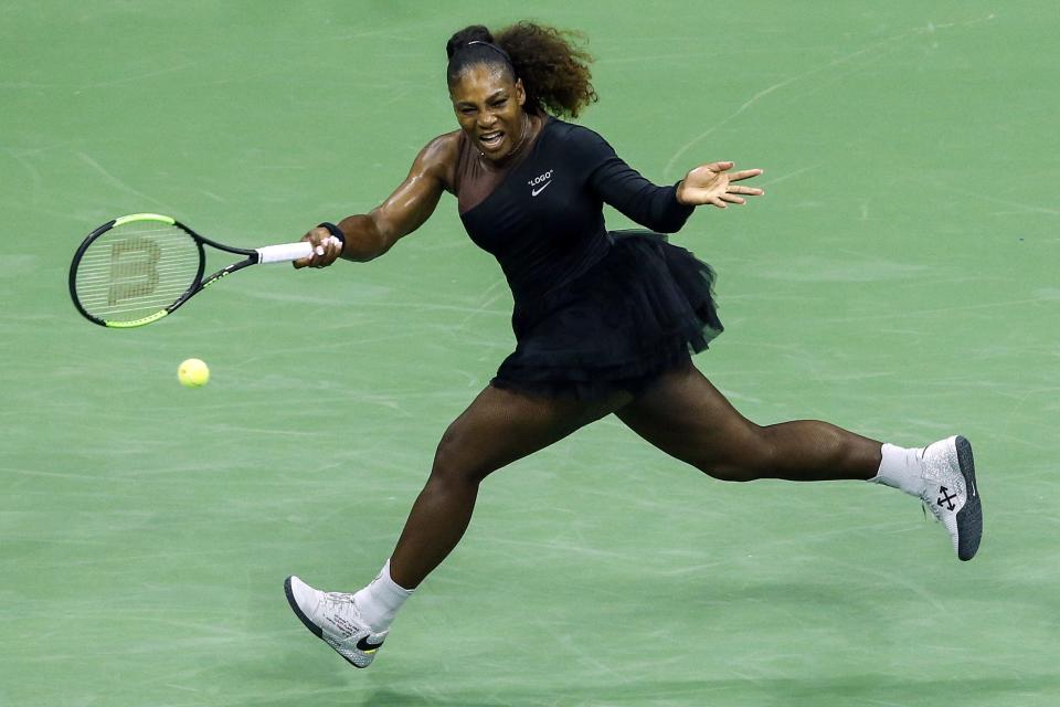 Serena Williams of the US hits a return to Magda Linette (out of frame) of Poland during their 2018 US Open Women's Singles match at the USTA Billie Jean King National Tennis Center in New York on August 27, 2018.