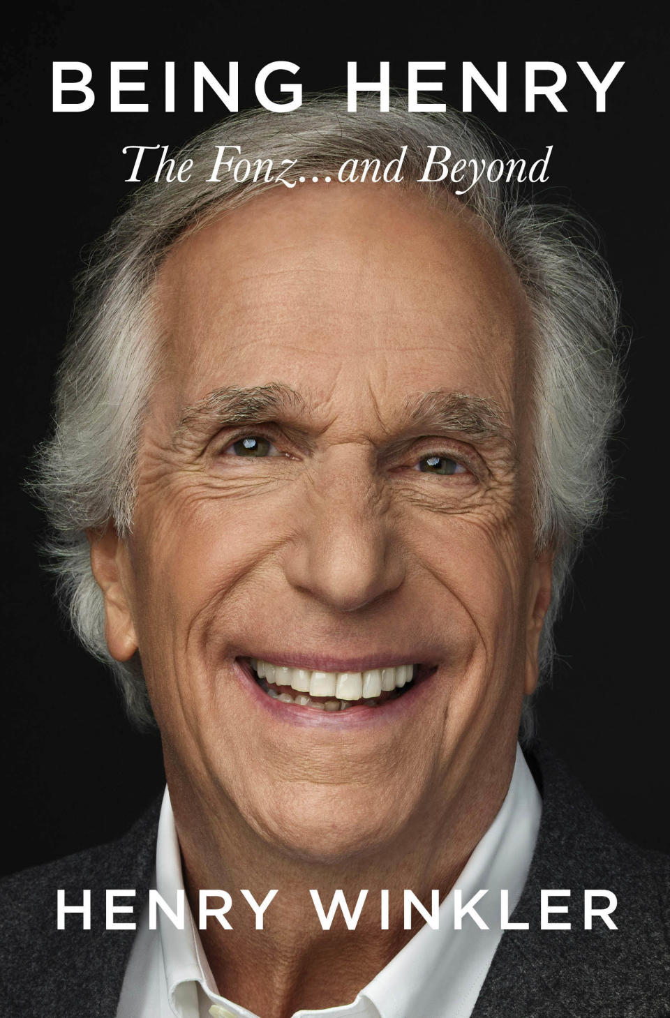 This cover image released by Celadon Books shows "Being Henry: The Fonz...and Beyond" by Henry Winkler. (Celadon Books via AP)