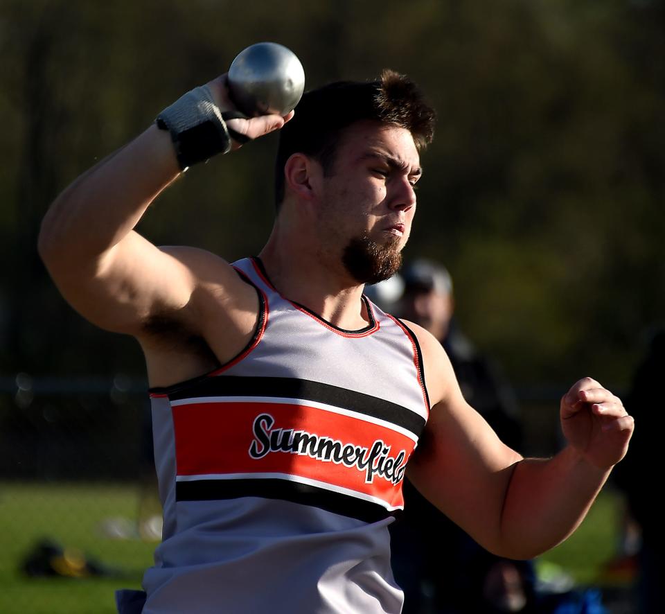 Dakota Kohn of Summerfield gets ready to unleash a throw in the shot-put against Whiteford and Erie Mason Tuesday, April 18, 2023.