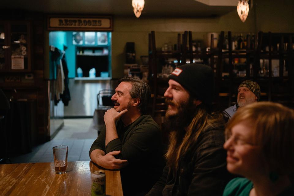 A Cafe Berlin crowd watches Detect Nerd in action at a February event