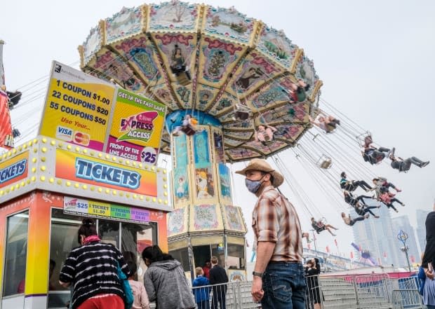 Spending was up at hotels and restaurants in Calgary during the Stampede July 9-18, a trend mirrored across the province. (Jeff McIntosh/The Canadian Press - image credit)