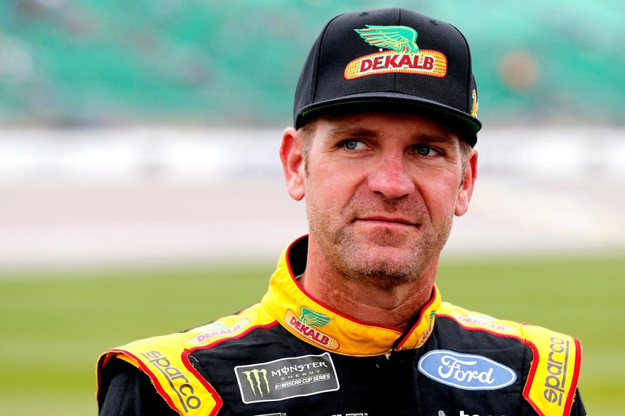 Clint Bowyer, driver of the #14 DEKALB Ford, waits during qualifying for the Monster Energy NASCAR Cup Series Hollywood Casino 400 at Kansas Speedway on October 19, 2019 in Kansas City, Kansas.