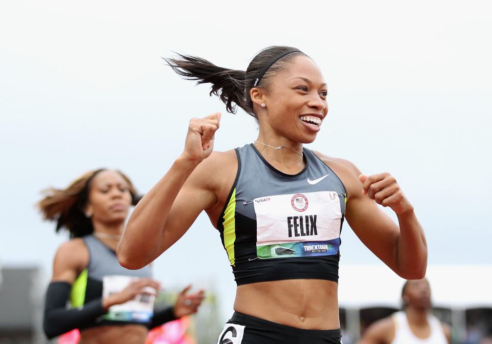 Allyson Felix celebrates after winning the Women's 200 Meter Dash Final on day nine of the U.S. Olympic Track & Field Team Trials at the Hayward Field on June 30, 2012 in Eugene, Oregon. (Photo by Christian Petersen/Getty Images)