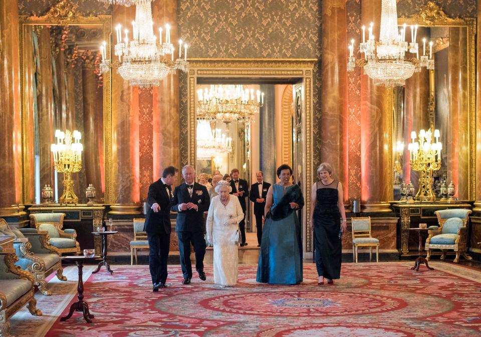 Queen Elizabeth II greets world leaders in the Blue Drawing Room at Buckingham Palace in 2018.