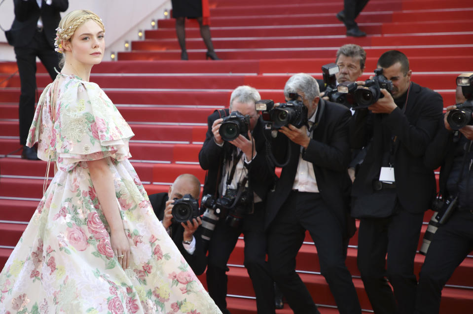 Jury member Elle Fanning poses for photographers upon arrival at the premiere of the film 'Les Miserables' at the 72nd international film festival, Cannes, southern France, Wednesday, May 15, 2019. (Photo by Vianney Le Caer/Invision/AP)