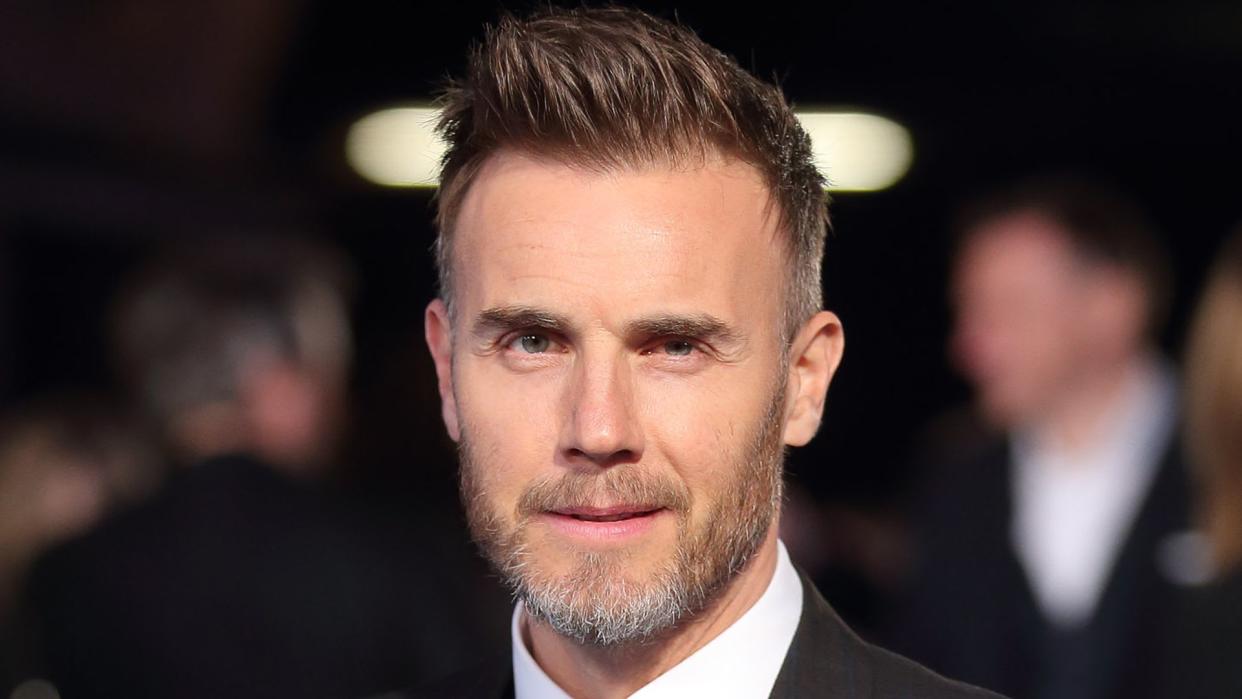 Gary Barlow wearing a smart suit 