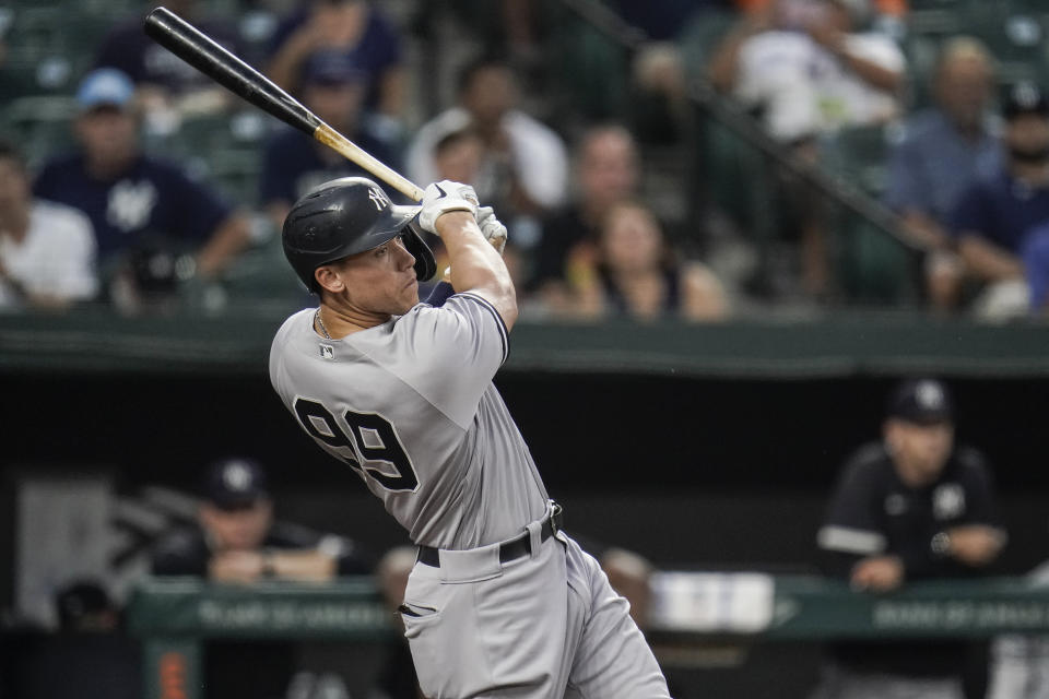 New York Yankees' Aaron Judge connects for a two-run home run off Baltimore Orioles starting pitcher Alexander Wells during the first inning of a baseball game, Tuesday, Sept. 14, 2021, in Baltimore. (AP Photo/Julio Cortez)