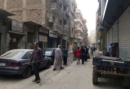 People walk on a street in Egypt’s Southern governorate of Minya, Egypt April 12, 2017. REUTERS/Amina Ismail