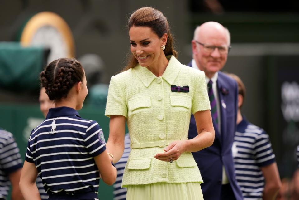 Princess Kate, center, keeping with a green theme.