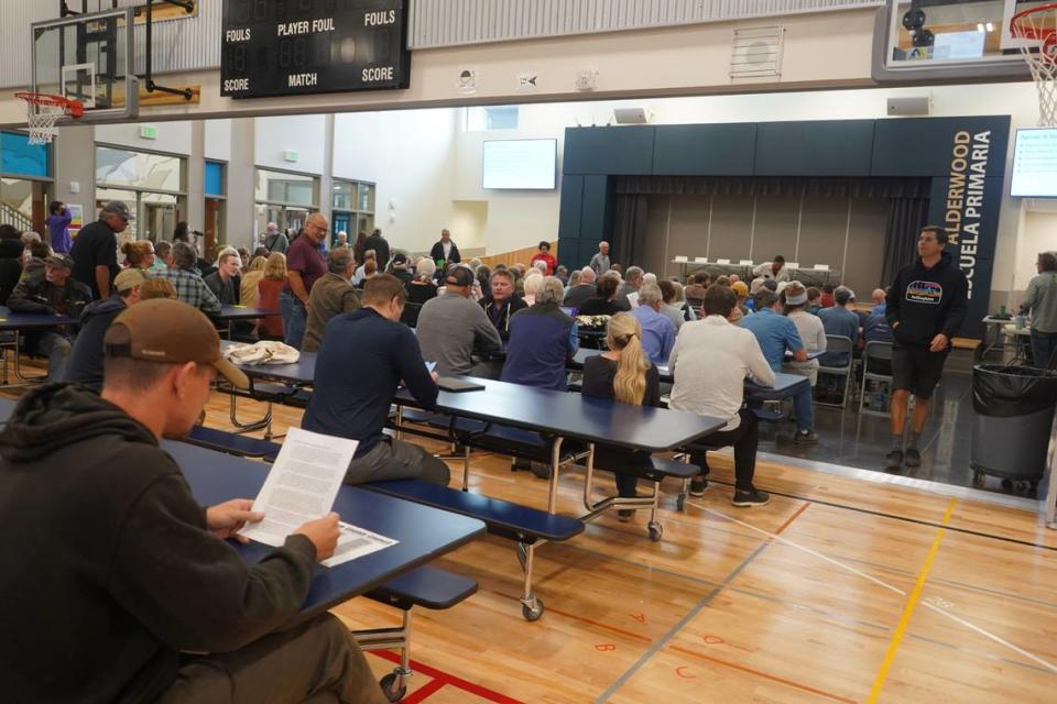 About 100 Bellingham community members gathered on Sept. 6, 2023, for an informational meeting about ABC Recycling’s proposed metal shredder facility at Alderwood Elementary School in Bellingham, Wash. A panel of county and city leaders, including Whatcom County Executive Satpal Sidhu and Bellingham Mayor Seth Fleetwood, answered community questions. ABC Recycling representatives also spoke.