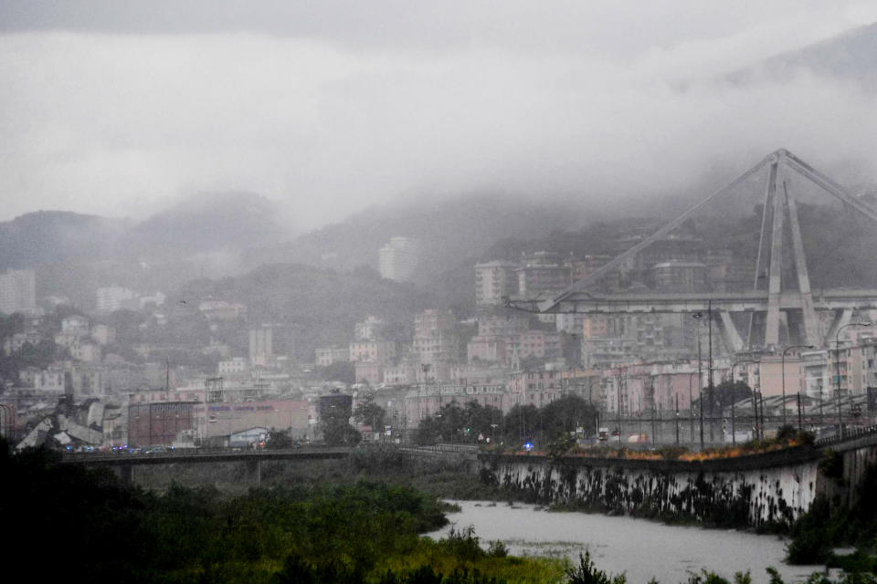 A view of the collapsed Morandi highway bridge in Genoa, on Tuesday August 14. Source: Luca Zennaro/ANSA via AP