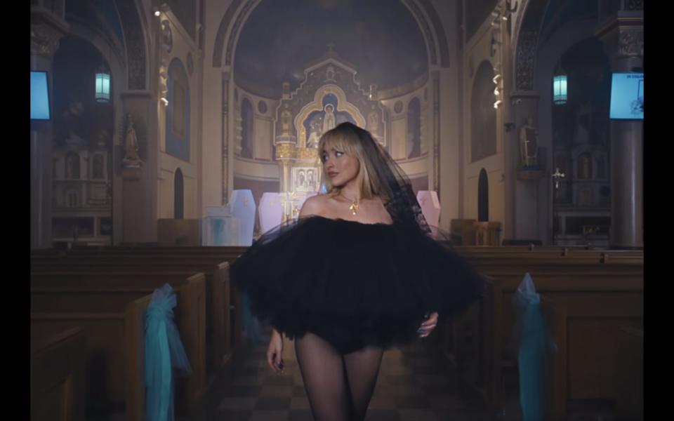 Sabrina Carpenter in the music video filmed at Our Lady of Mount Carmel-Annunciation Parish in Williamsburg, Brooklyn