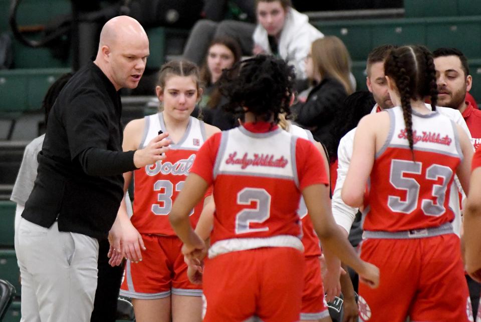 Canton South Head Coach Adam Hall talks to players in the second quarter of Laurel and Canton South OHSAA Division II District Semifinals at Nordonia High School. Wednesday, February 28, 2024.