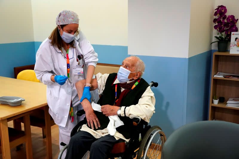 FILE PHOTO: Vaccination against coronavirus disease (COVID-19) in Madrid