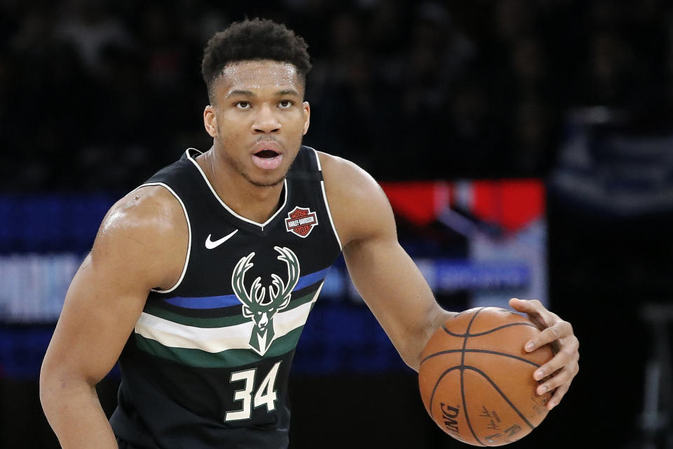 Milwaukee Bucks forward Giannis Antetokounmpo (34) in action during an NBA basketball game in Paris, Friday, Jan. 24, 2020. (AP Photo/Christophe Ena)