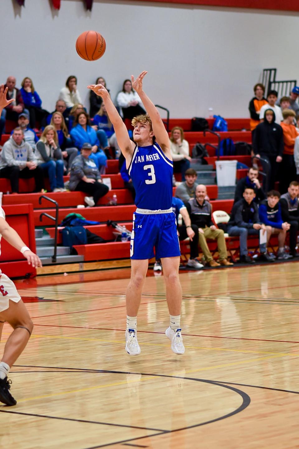 Van Meter's Carter Durflinger shoots a three-pointer during a game against Earlham on Friday, Dec. 16, 2022.