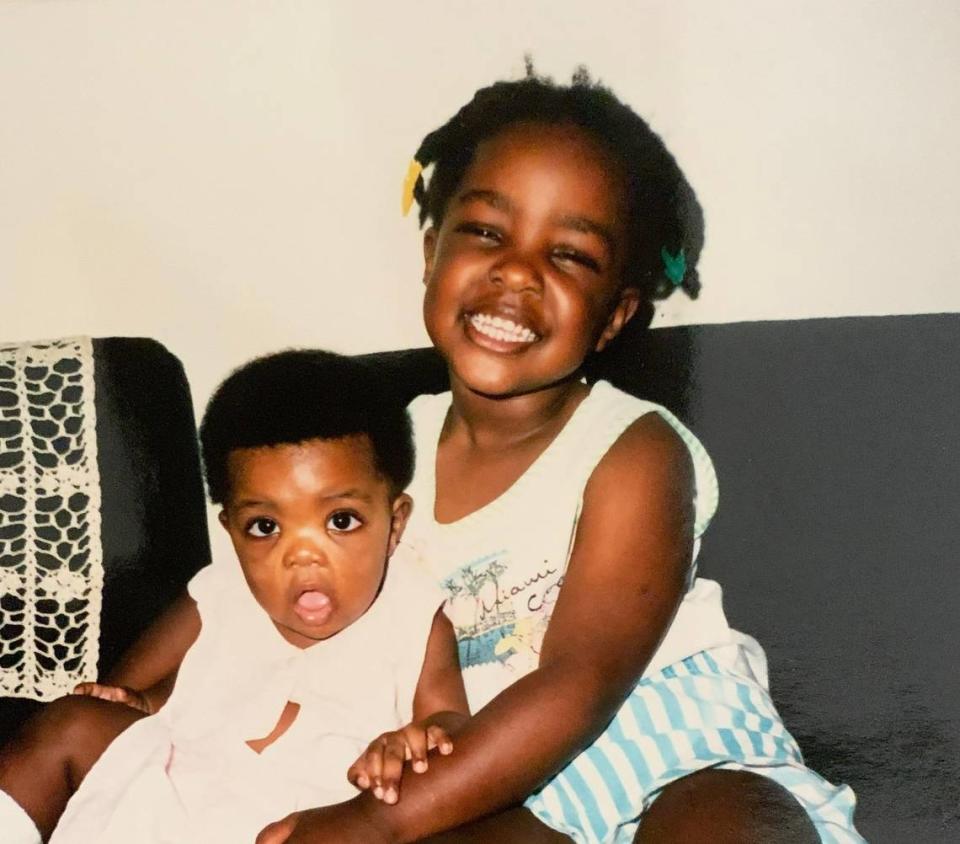 Sisters Deborah Gladney and Angela Muhwezi-Hall as children.