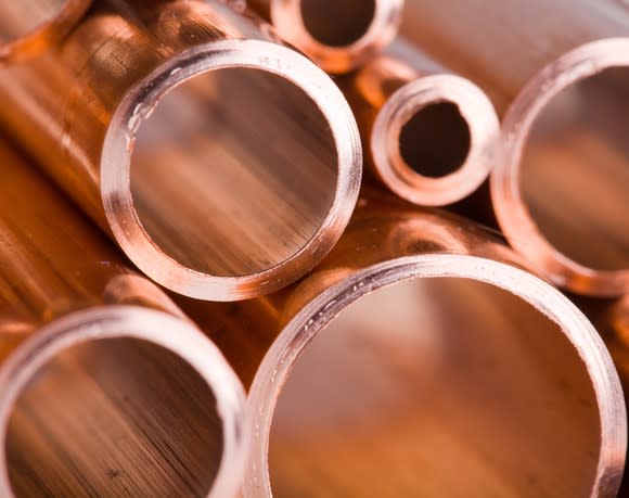 A bundle of different sized copper pipes.