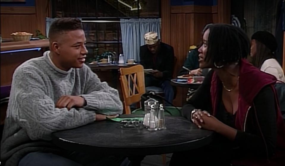 Terrence Howard and Erika Alexander in a scene from "Living Single"