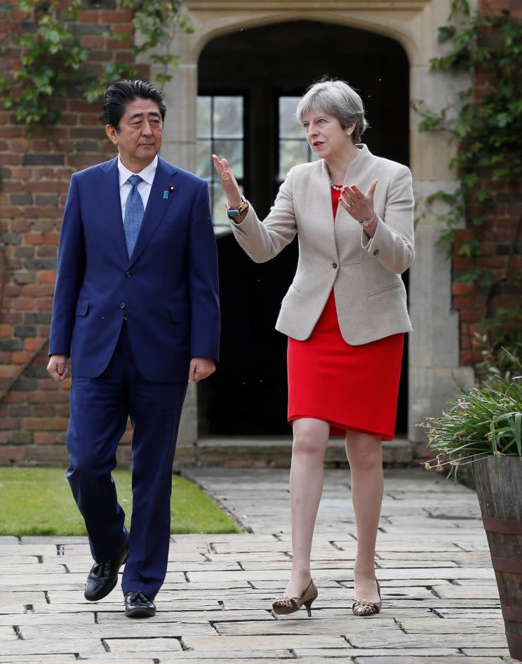 Mrs May meeting the Japanese PM on Friday (Reuters)