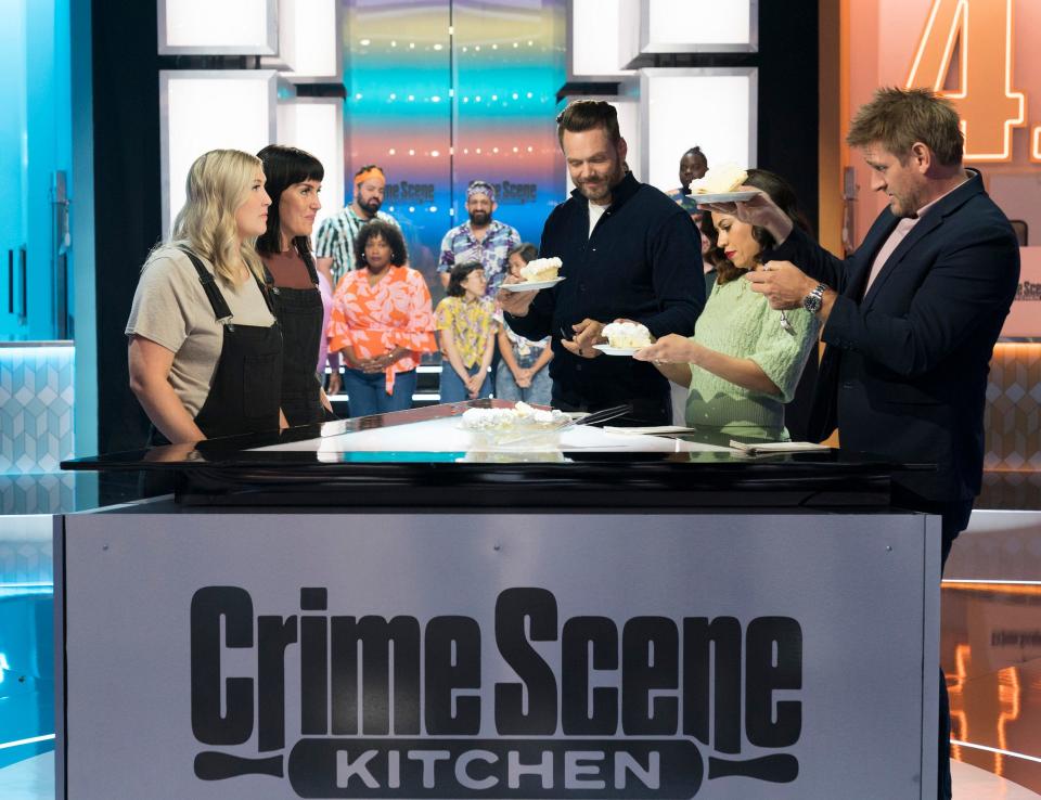 Contestants Kathleen Regelman, from left, and Hannah Reyes with host Joel McHale and judges Yolanda Gampp and Curtis Stone in the season premiere of the Fox reality cooking competition "Crime Scene Kitchen," which will air at 8 p.m. June 5. Regelman and Reyes are the owners of Cup & Cake and Kreger's Bakery in Wausau.