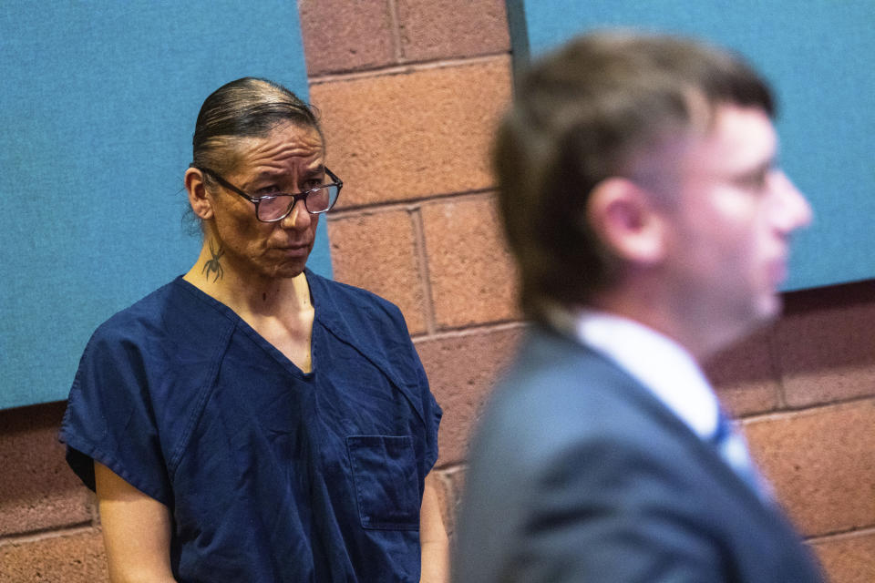 Nathan Chasing Horse listens to Chief Deputy Clark County District Attorney William Rowles speaking in court in North Las Vegas, Nev., Wednesday, Feb. 8, 2023. Bail has been set at $300,000 for the former "Dances With Wolves" actor charged in Nevada with sexually abusing and trafficking Indigenous women and girls. (AP Photo/Ty O'Neil)